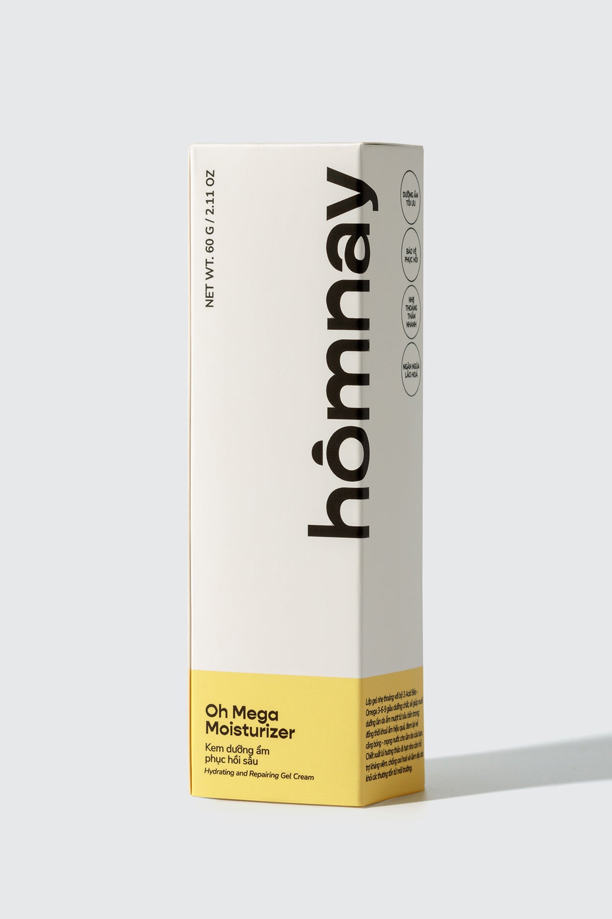 yellow white paper packaging of homnay beauty oh mega moisturizer